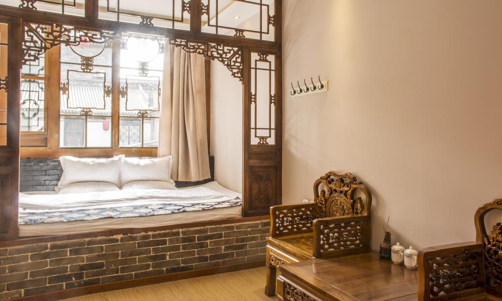 Fly By Knight Pingyao Courtyard Hotel Exterior photo